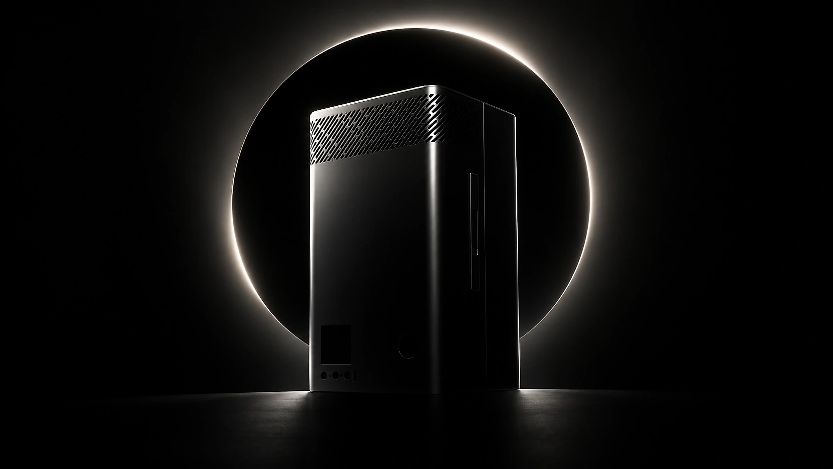 The Zuture intelligent air treatment unit, a brushed-aluminium wall-mounted prototype, backlit by a ring of light against black